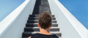 a man climbing stadium stairs