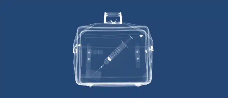 X-ray of a bag with a syringe inside