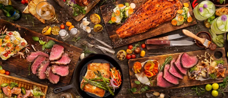 A spread that includes steak, lobster, eggs, and other foods that boost testosterone