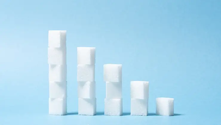 sugar cubes stacked in a line