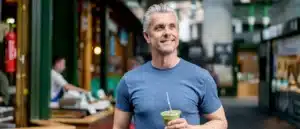 healthy man having a smoothie