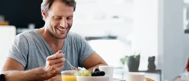 man eating breakfast