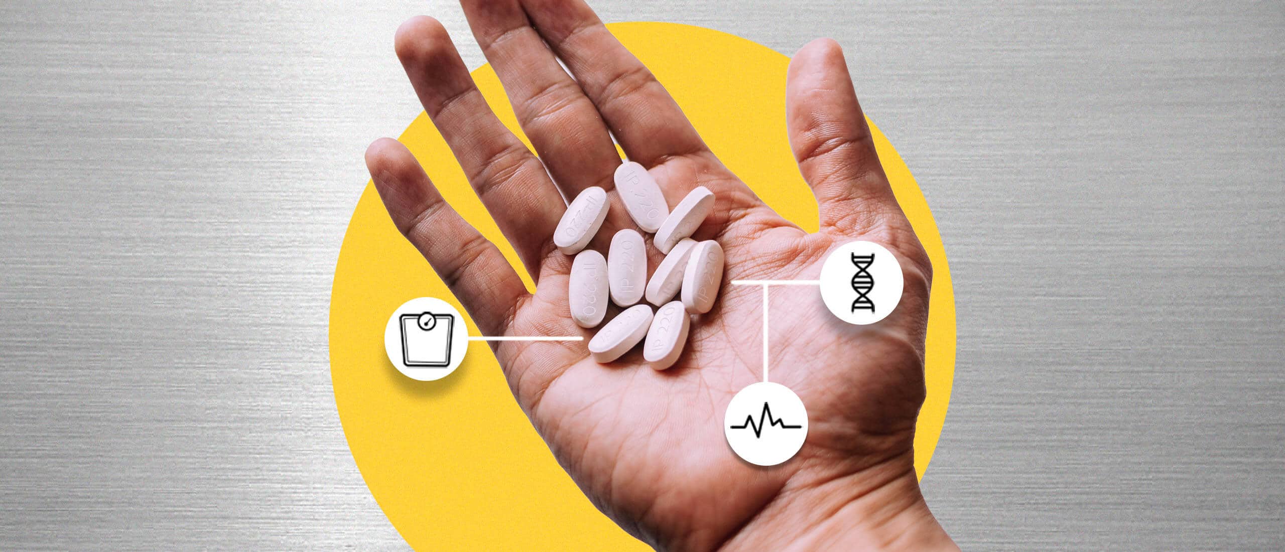 a hand holding metformin pills