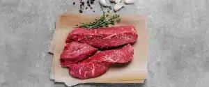 Raw steak on butcher paper