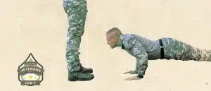 drill sergeant standing over recruit doing pushups