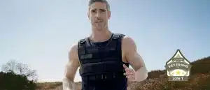 Man running wearing a weighted vest