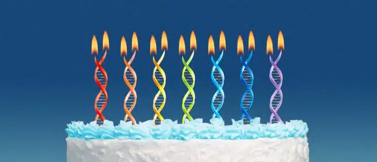 Double helix candles on a cake