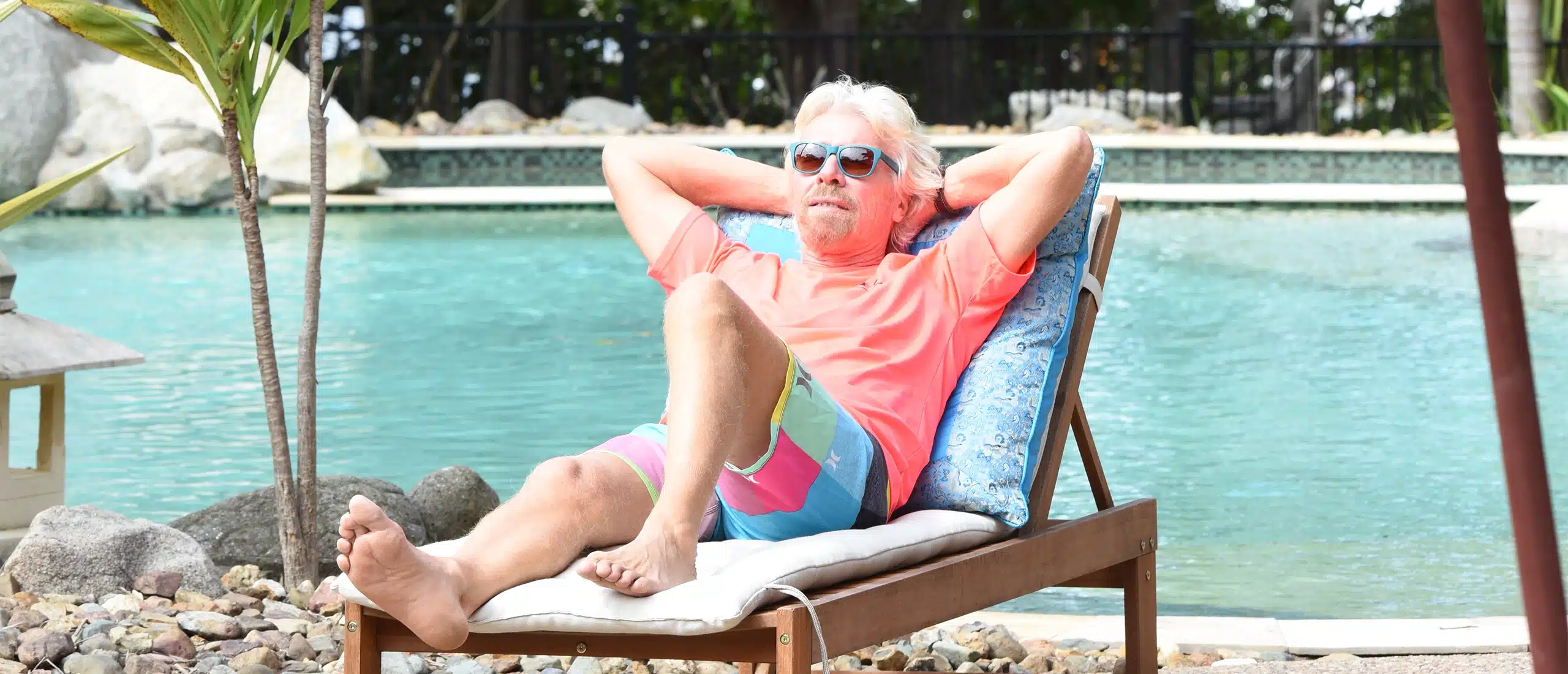 Richard Branson relaxing by the pool