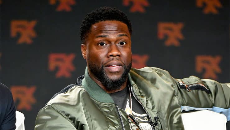 Kevin Hart sitting on stage for FX