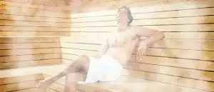 man chilling in the sauna