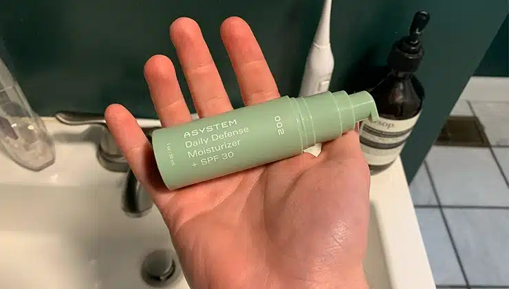 Asystem Skincare Daily Defense Moisturizer in hand