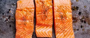 Salmon filets on a metal background