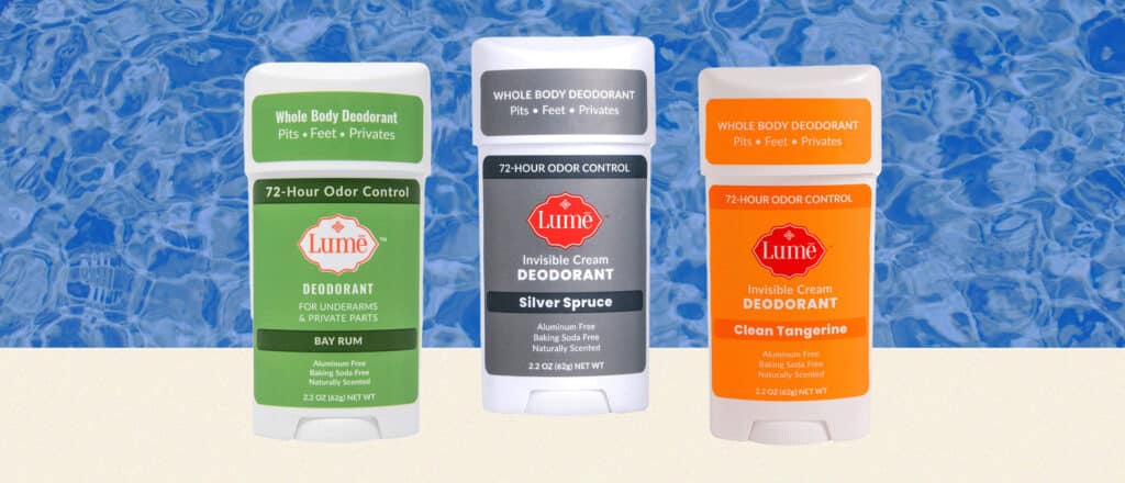 Lume Deodorant on beige countertop and blue background
