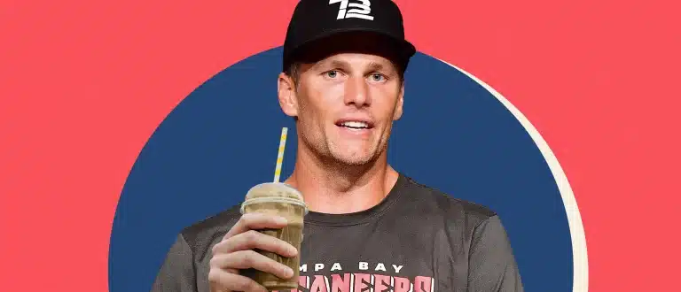 Tom Brady holding a smoothie