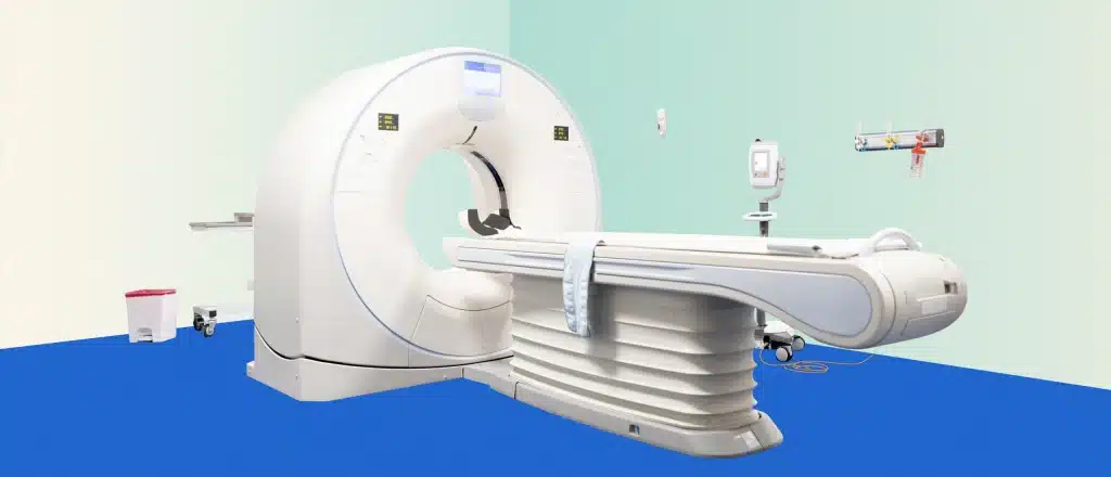 MRI machine on a turquoise background