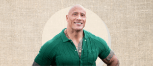Dwayne "The Rock" Johnson smiles in a green shirt