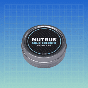 nut rub cologne on blue background