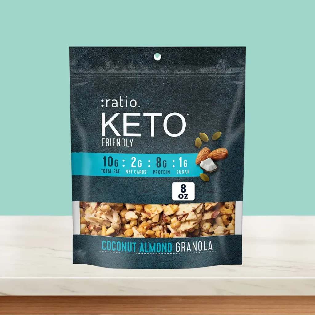 Ratio Keto Granola on table and green background