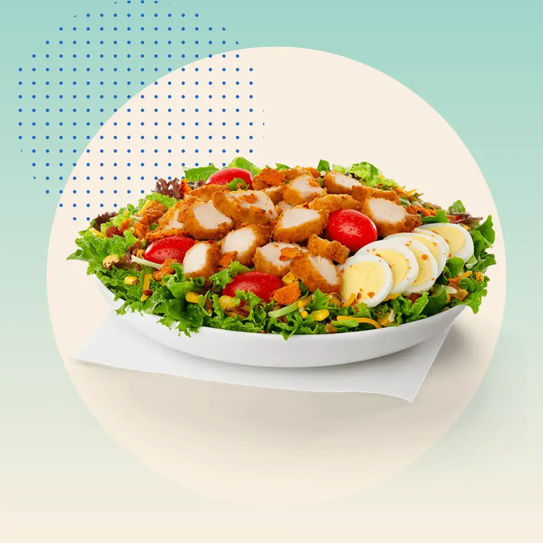 Chick-Fil-A Cobb Salad with Grilled Fillet on green background