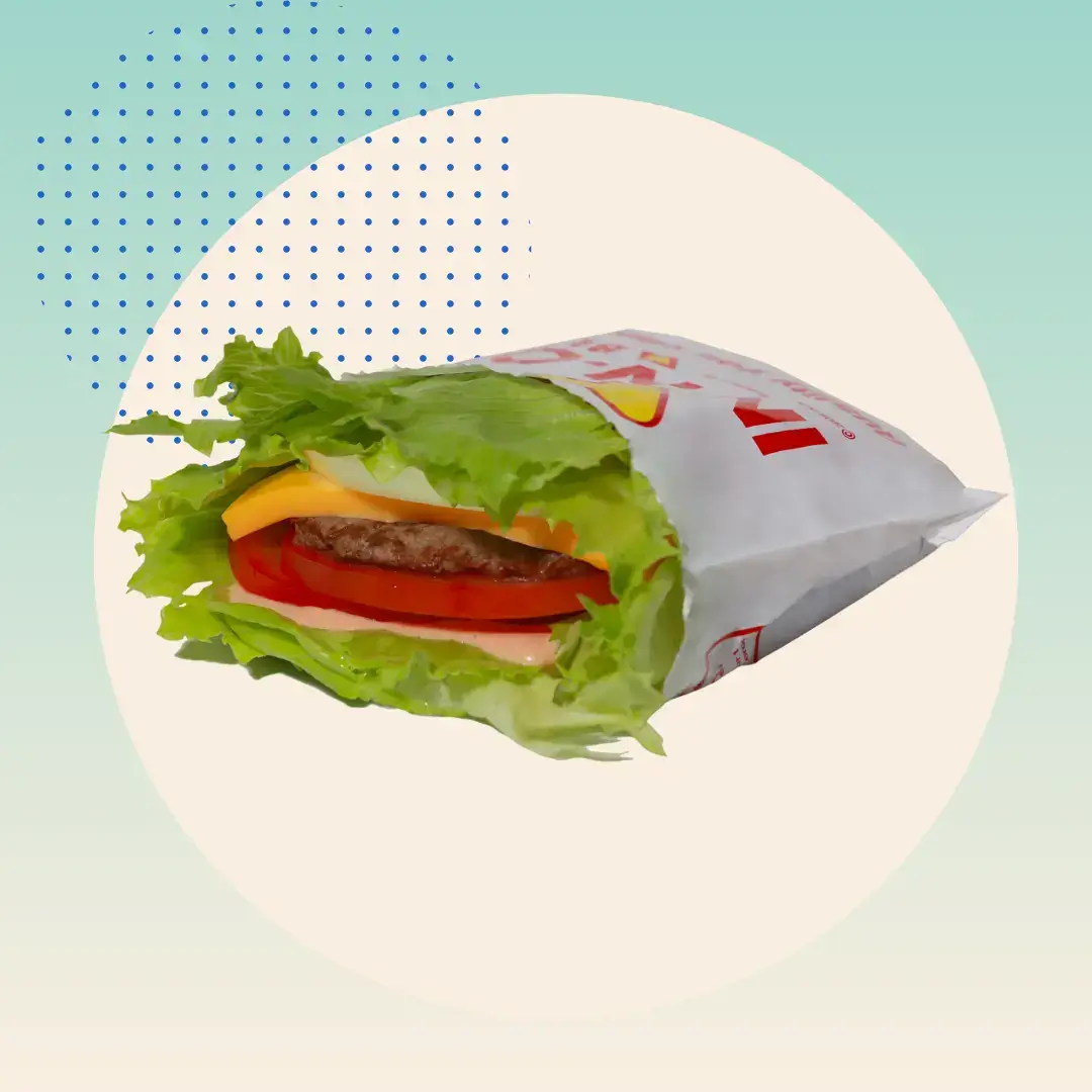 In-n-Out Protein Style Double-Double on green background