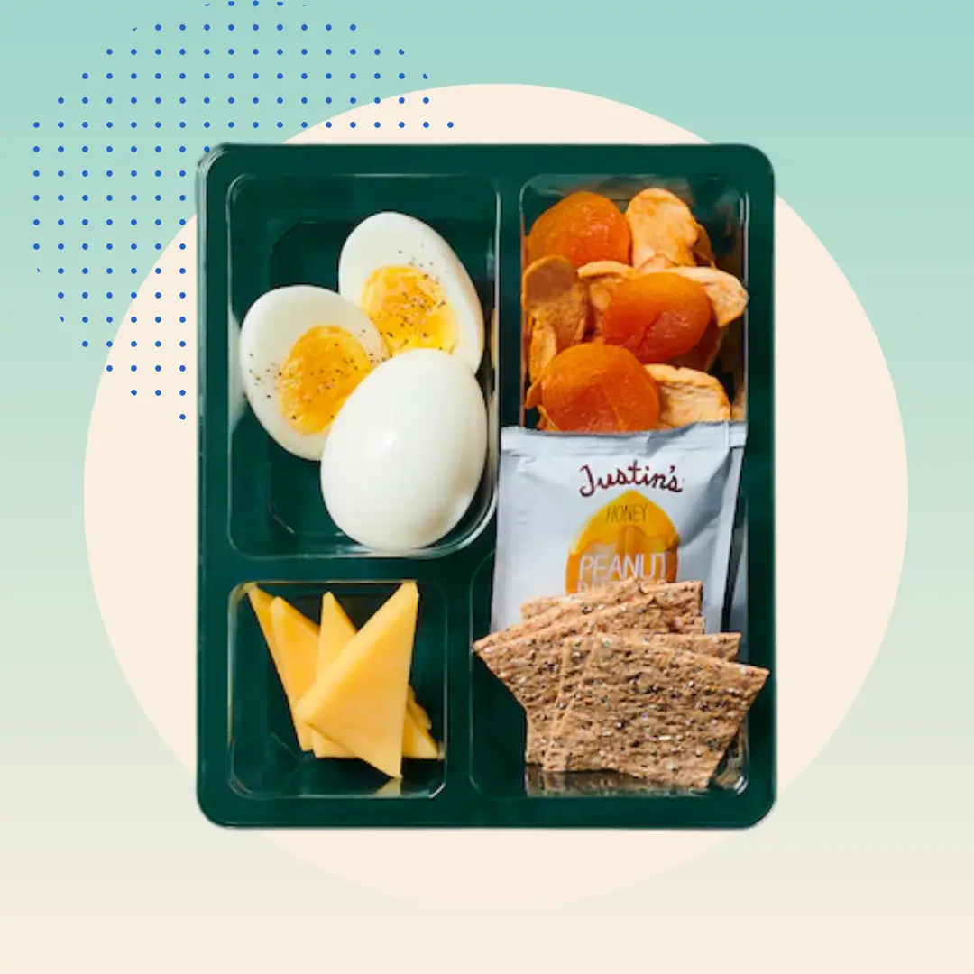 Starbucks Eggs and Cheddar Protein Box on green background