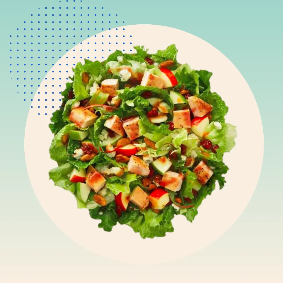 Wendy's Apple Pecan Salad on green background