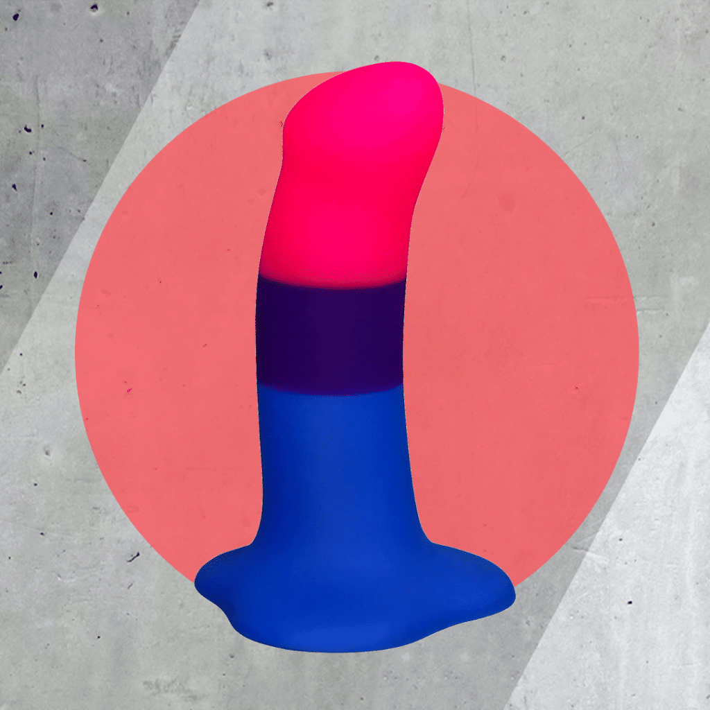 the bi amor dildo on red and cement background