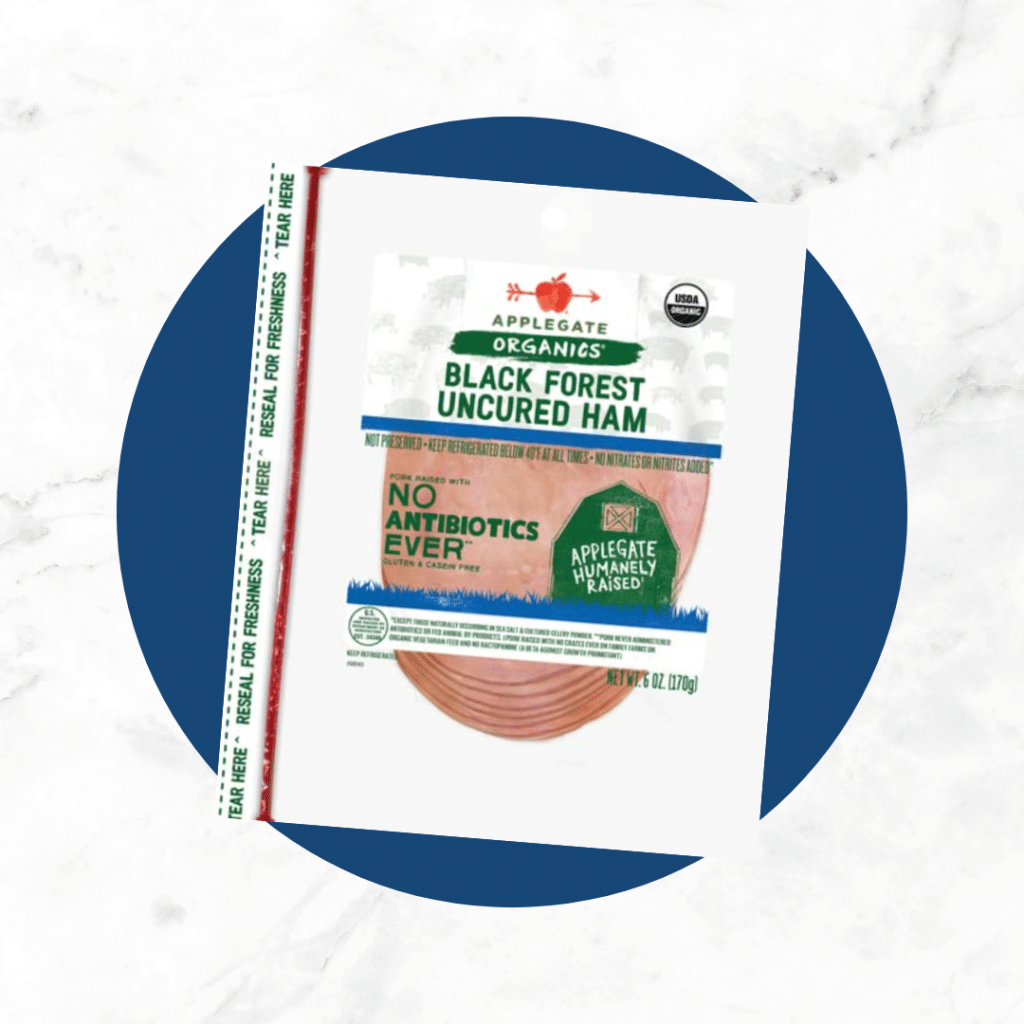 Applegate Organic Black Forest Uncured Ham on blue circle and marble background
