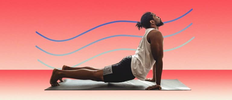 Man doing yoga pose on red background