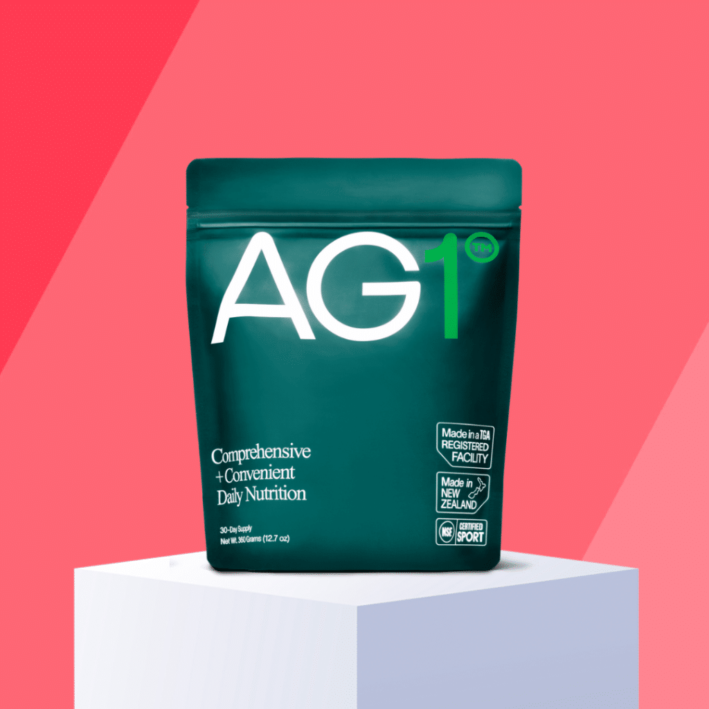AG1 Comprehensive Convenient Daily Nutrition on red background