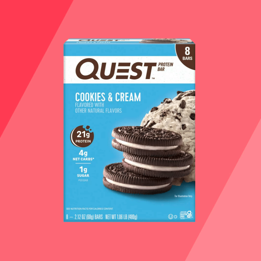 Quest Cookies and Cream Protein Bar on red background