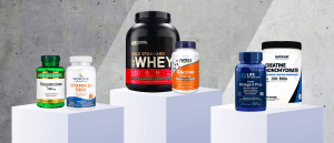Supplements on a white pedestal on cement background