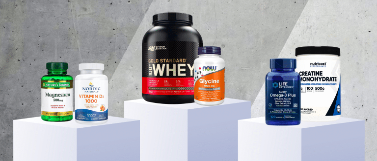 Supplements on a white pedestal on cement background