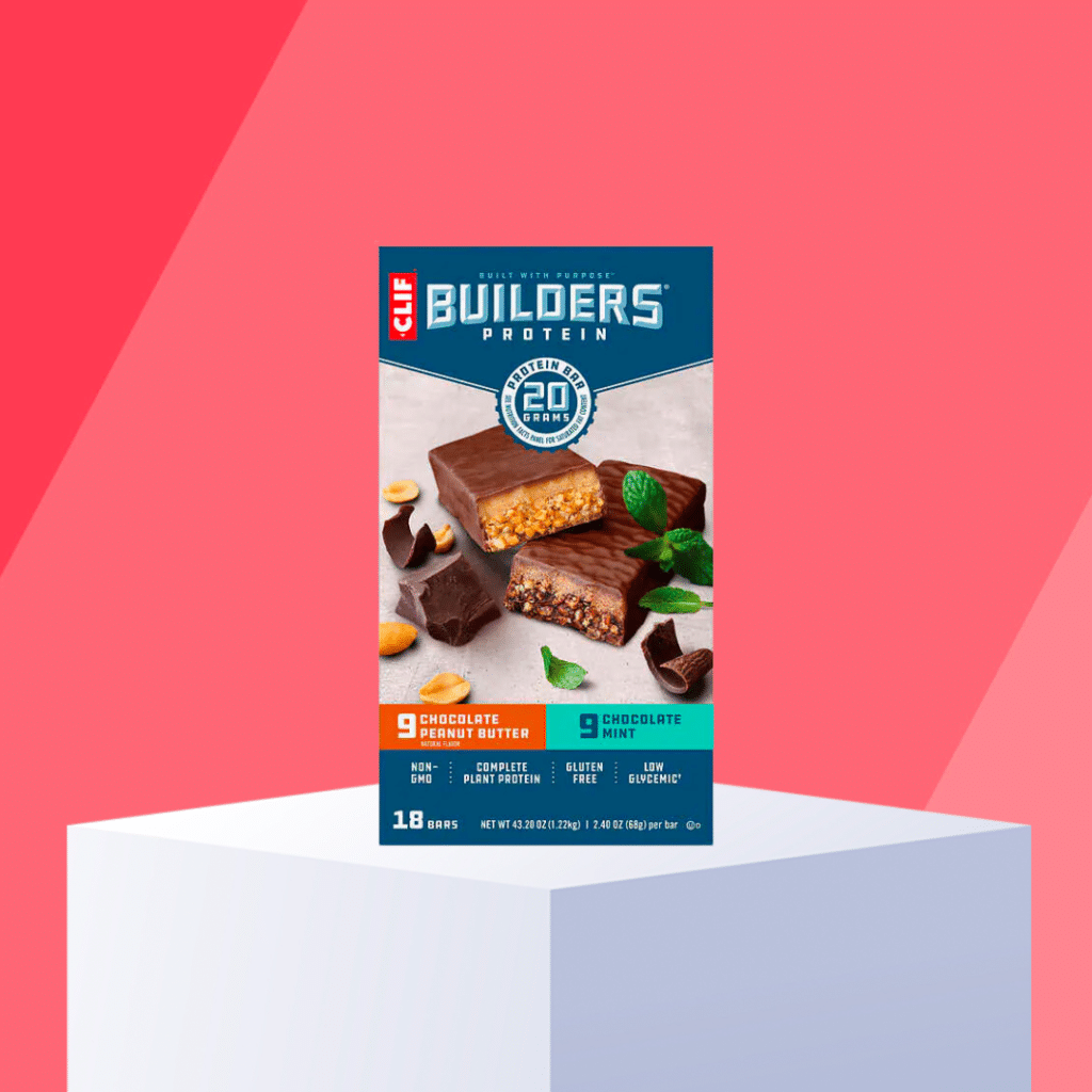 clif builders bar protein bars on pedestals with red background