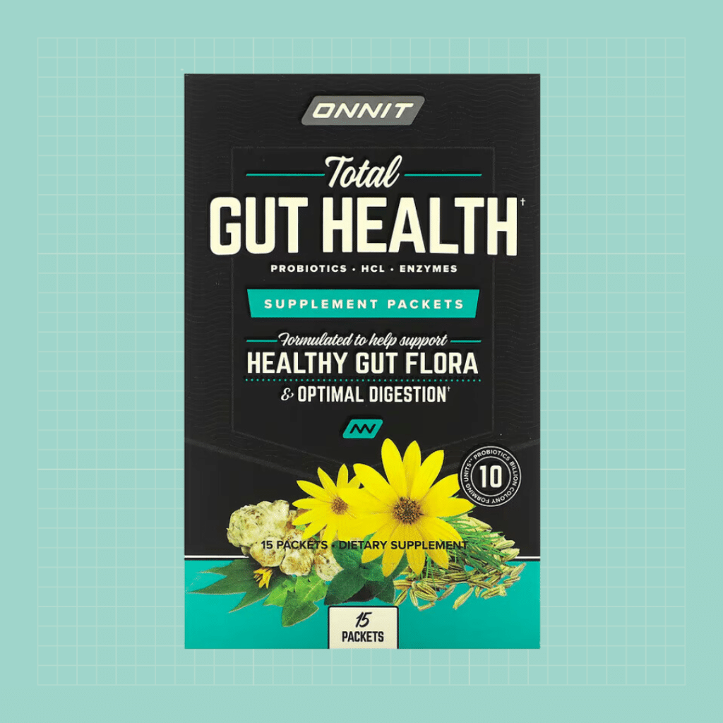 Onnit Total Gut Health Supplement on green background