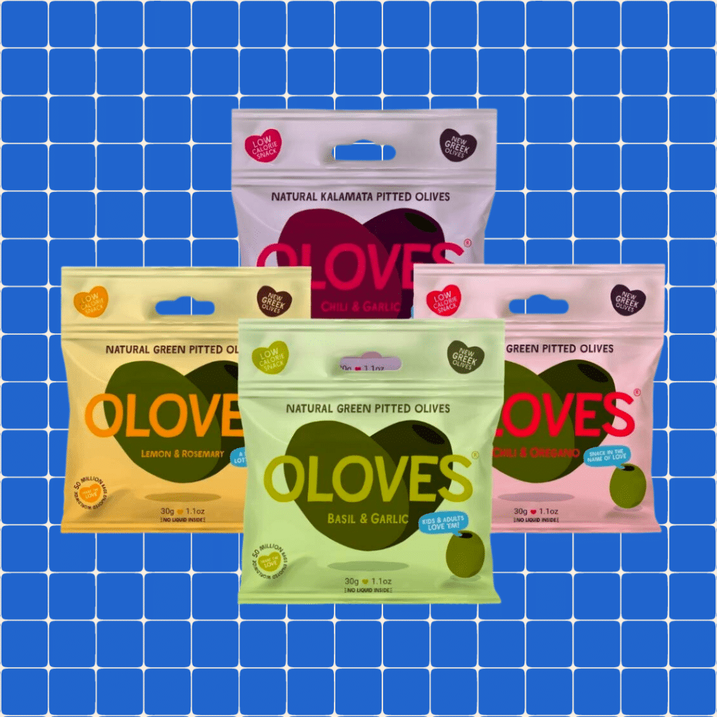 Oloves pitted olives on blue grid background