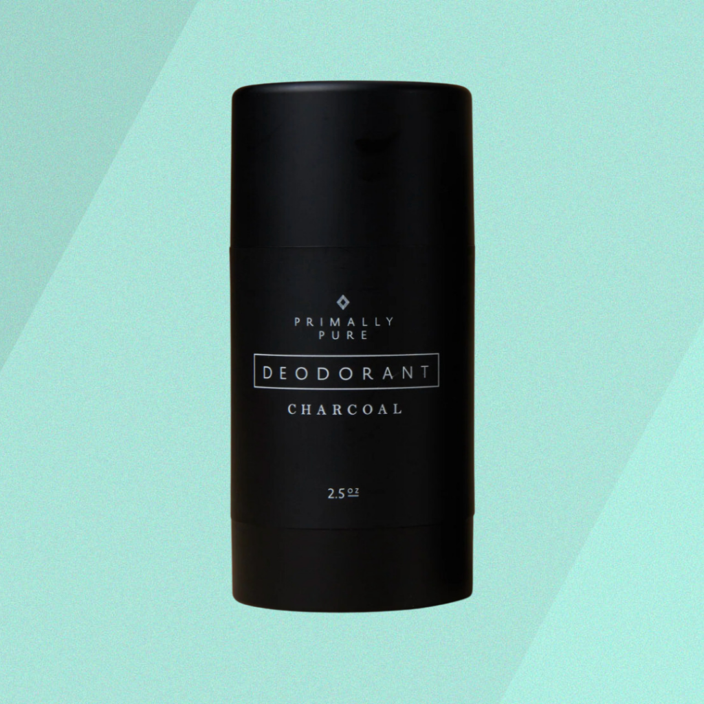 Primally Pure natural charcoal deodorant on green background