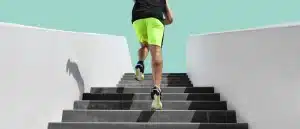 man running up a never-ending staircase.