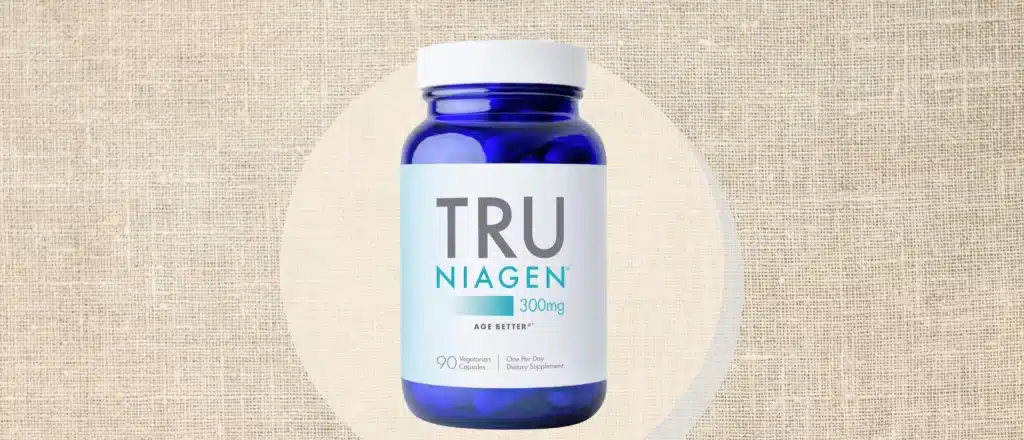 bottle of tru niagen supplement on textured background