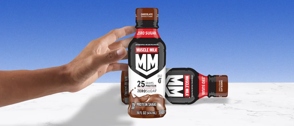 Man reaching for a bottle of muscle milk