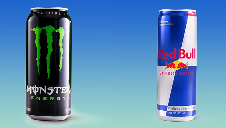 monster and red bull energy drink cans