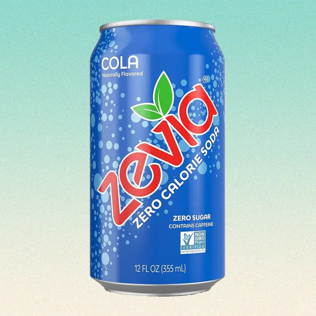 can of Zevia soda on green background
